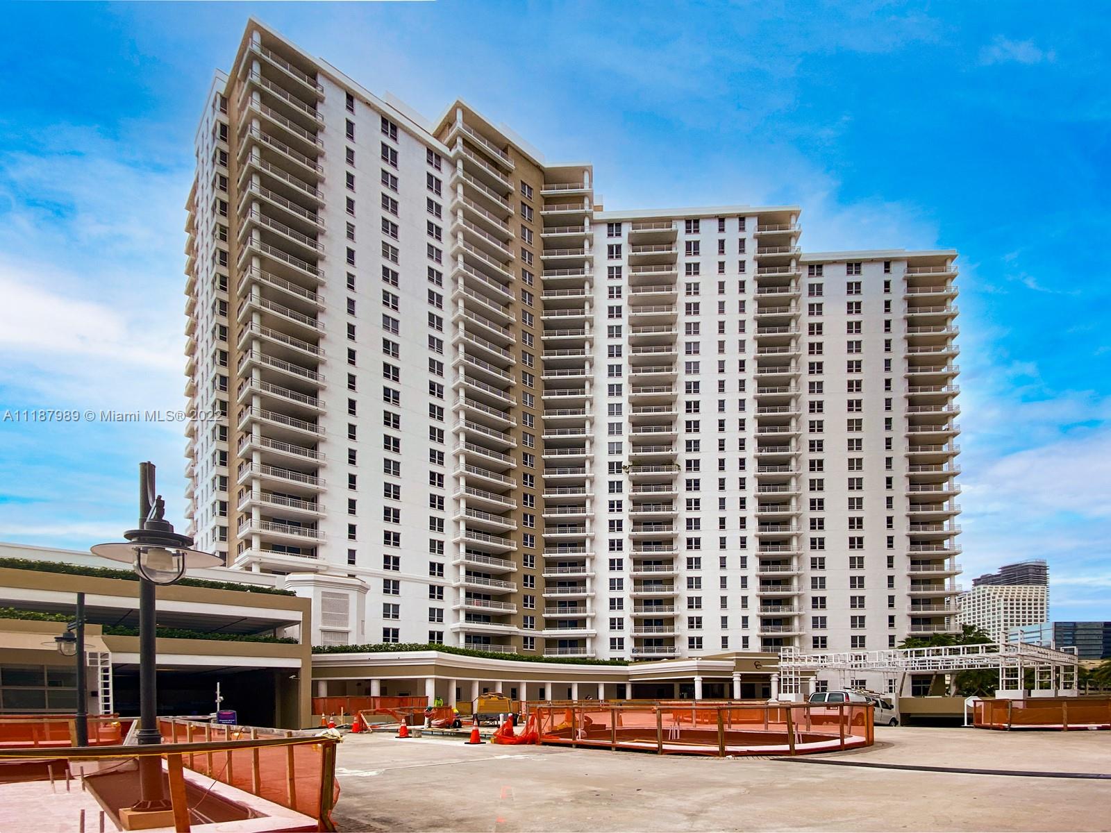 701 Brickell Key Boulevard, Unit LPH07 Miami, FL 33131 - Photo 1 of 25 a front view of a building with a street