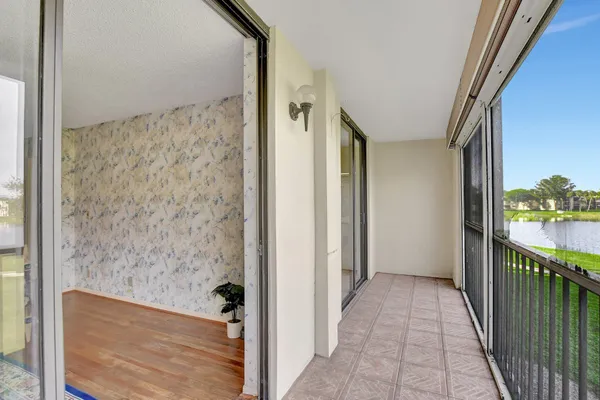 a view of a bathroom from a hallway