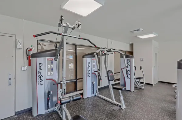 a view of a room with gym equipment