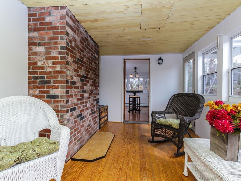 1991 Harpswell Islands Road Bailey Island, ME 04003 - Photo 11 of 16 Separate sun room located off the...