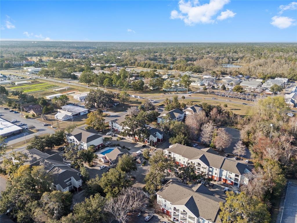 2360 Southwest Archer Road, Unit 607 Gainesville, FL 32608 - Photo 19 of 50 an aerial view of residential building with outdoor space