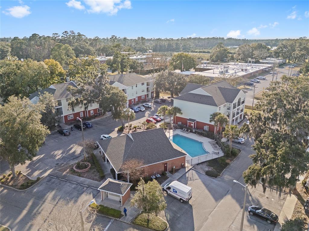 2360 Southwest Archer Road, Unit 607 Gainesville, FL 32608 - Photo 26 of 50 an aerial view of a house with a yard
