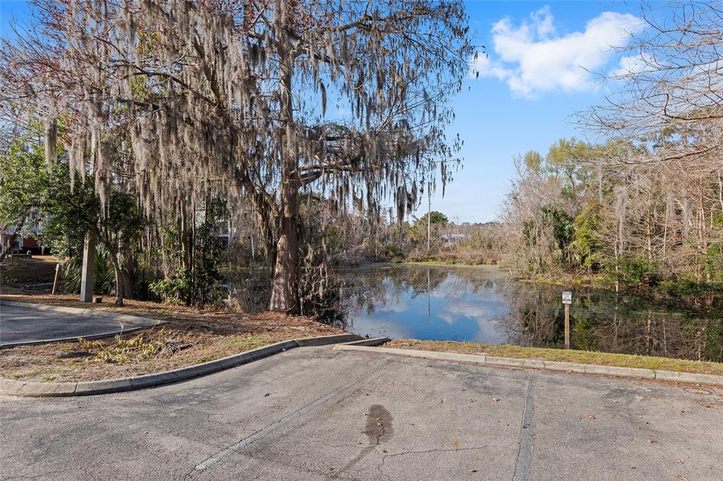 2360 Southwest Archer Road, Unit 607 Gainesville, FL 32608 - Photo 27 of 50 a view of a yard with large trees