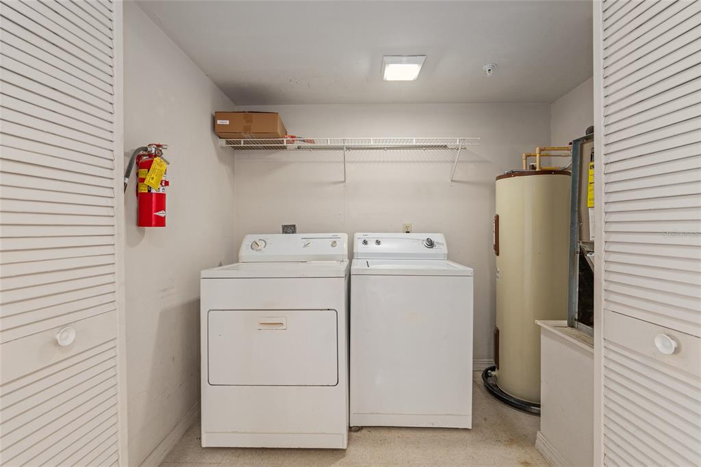 2360 Southwest Archer Road, Unit 607 Gainesville, FL 32608 - Photo 41 of 50 a utility room with dryer and washer