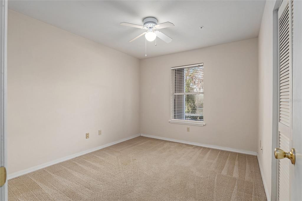 2360 Southwest Archer Road, Unit 607 Gainesville, FL 32608 - Photo 48 of 50 wooden floor in an empty room with a window