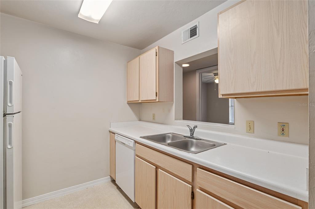 2360 Southwest Archer Road, Unit 607 Gainesville, FL 32608 - Photo 6 of 50 a bathroom with a sink and a mirror