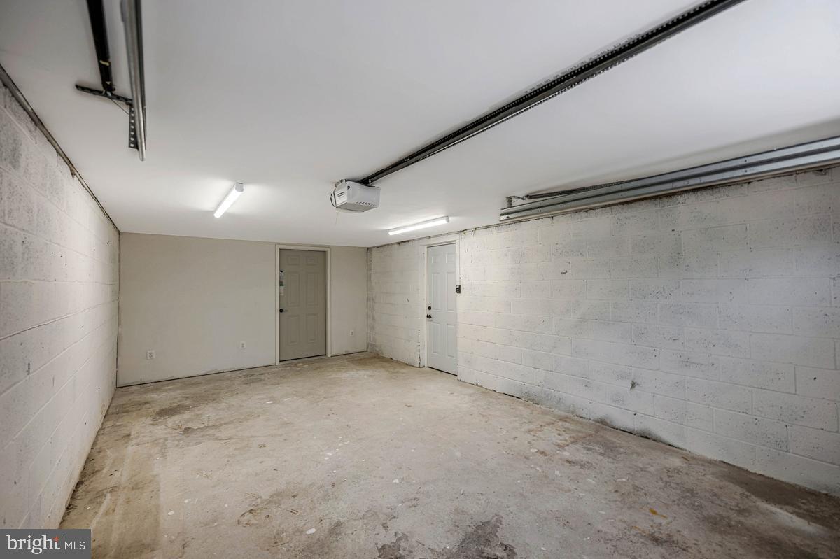 13304 Cherry Tree Crossing Road Brandywine, MD 20613 - Photo 13 of 32 Spacious, versatile garage space.