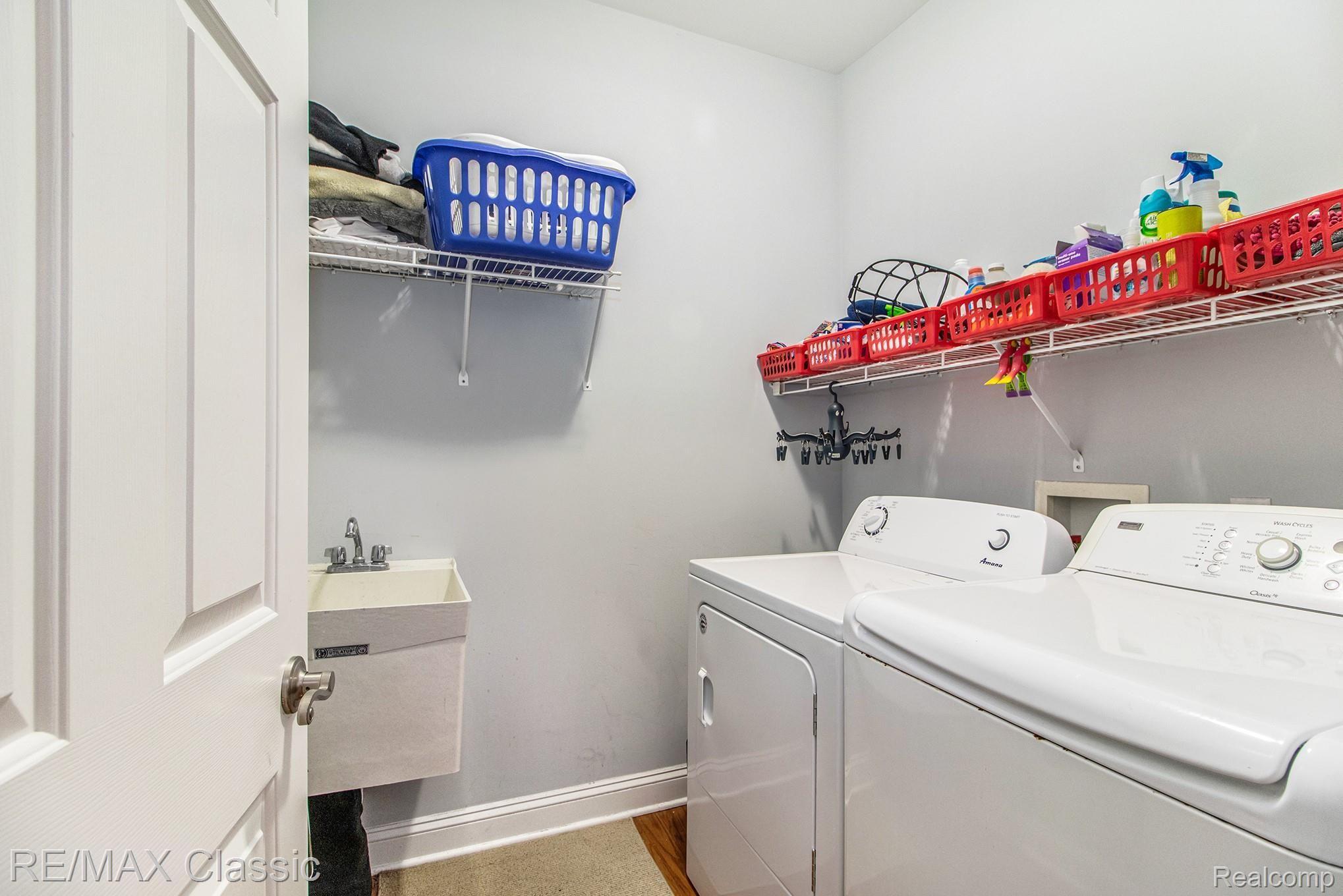 24749 Reeds Pointe Drive, Unit 38 Novi, MI 48374 - Photo 20 of 46 1st Floor Laundry Room
