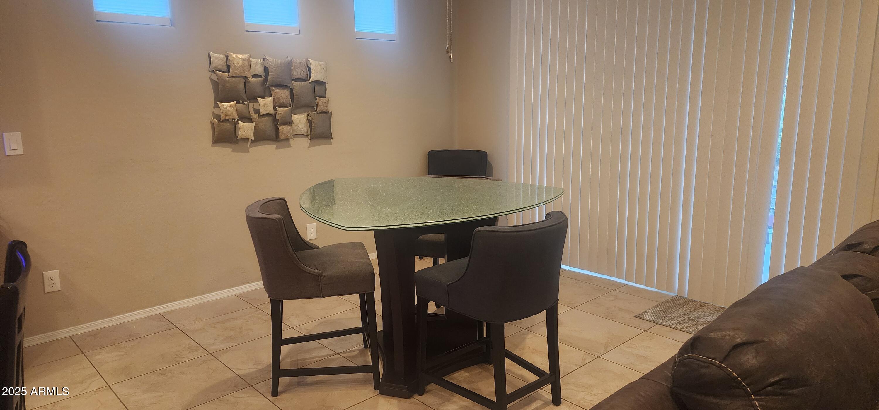 20602 North 274th Avenue Buckeye, AZ 85396 - Photo 4 of 22 a view of a workspace with furniture