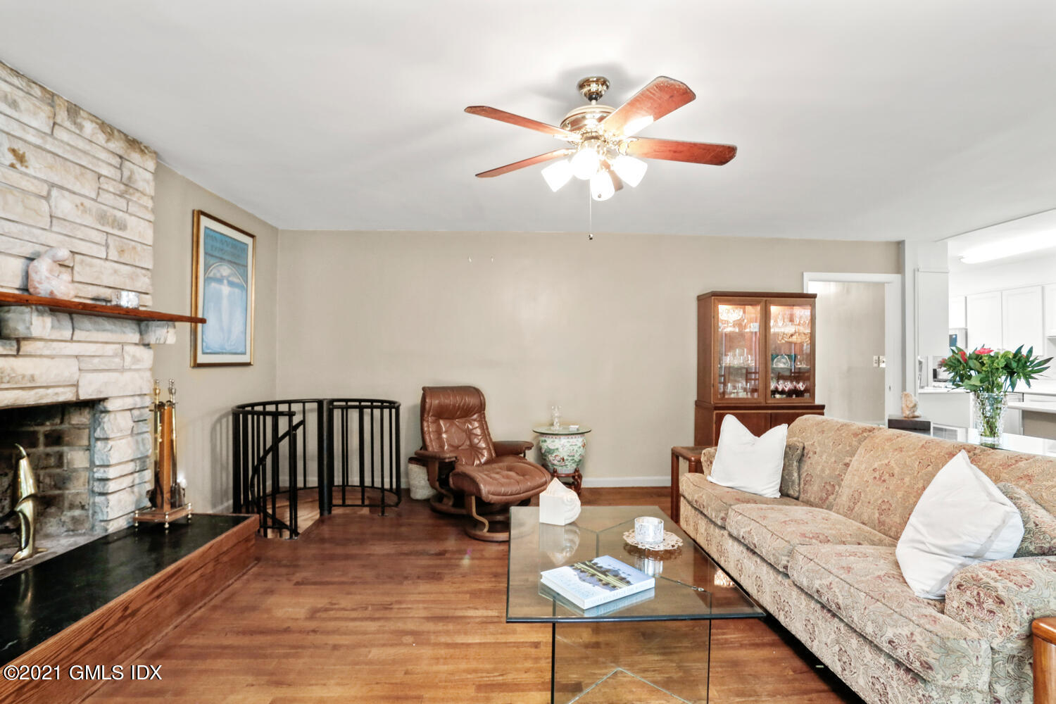 33 Mary Lane Riverside, CT 06878 - Photo 6 of 34 a living room with furniture and a fireplace