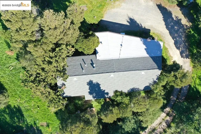 a backyard of a house with trees