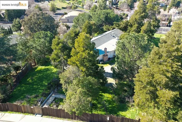 a view of backyard with green space