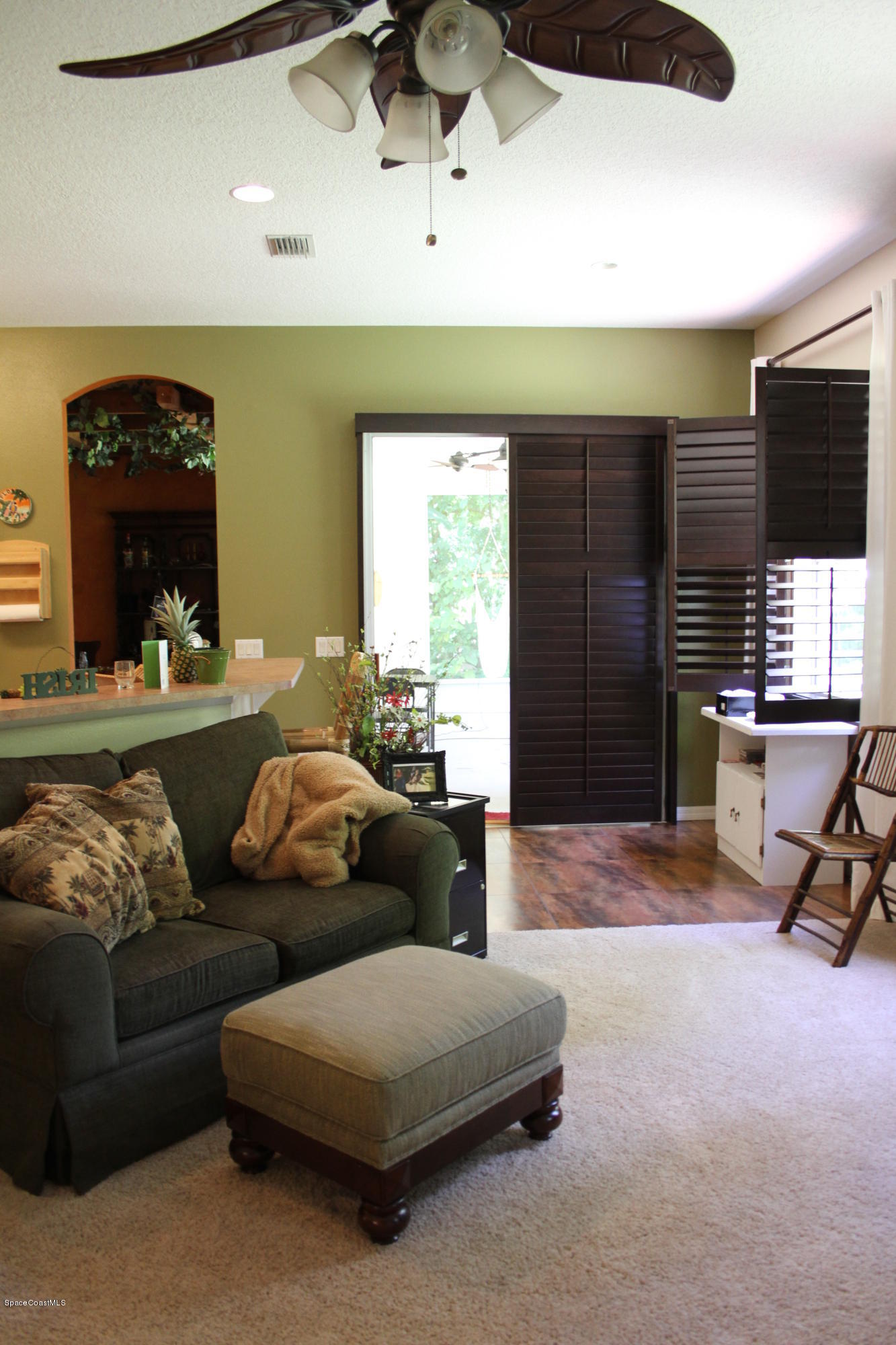 795 Seymour Road Northeast Palm Bay, FL 32905 - Photo 14 of 46 FAMILY ROOM TO KITCHEN NOOK