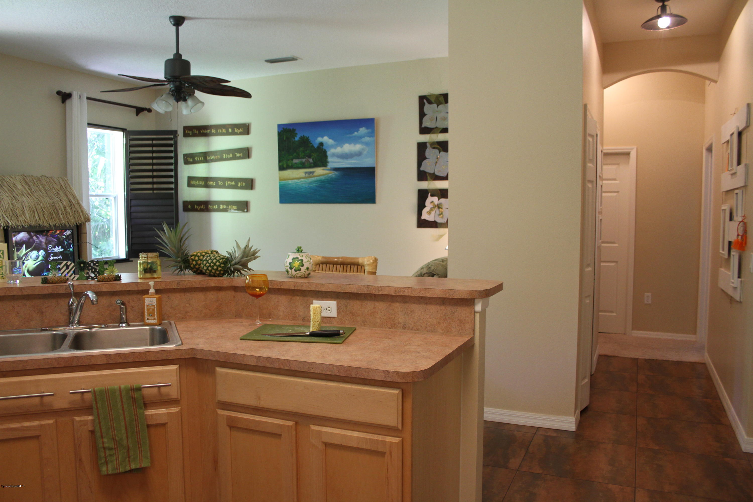 795 Seymour Road Northeast Palm Bay, FL 32905 - Photo 17 of 46 VIEW TO FAMILY ROOM
