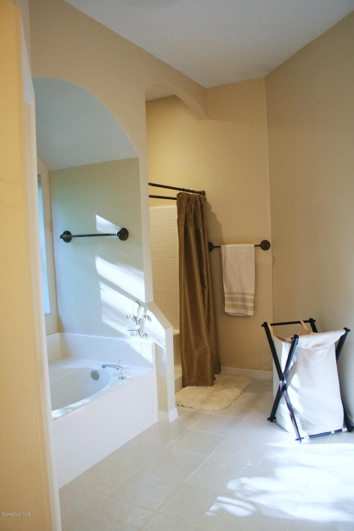 795 Seymour Road Northeast Palm Bay, FL 32905 - Photo 27 of 46 LARGE MASTER BATHROOM