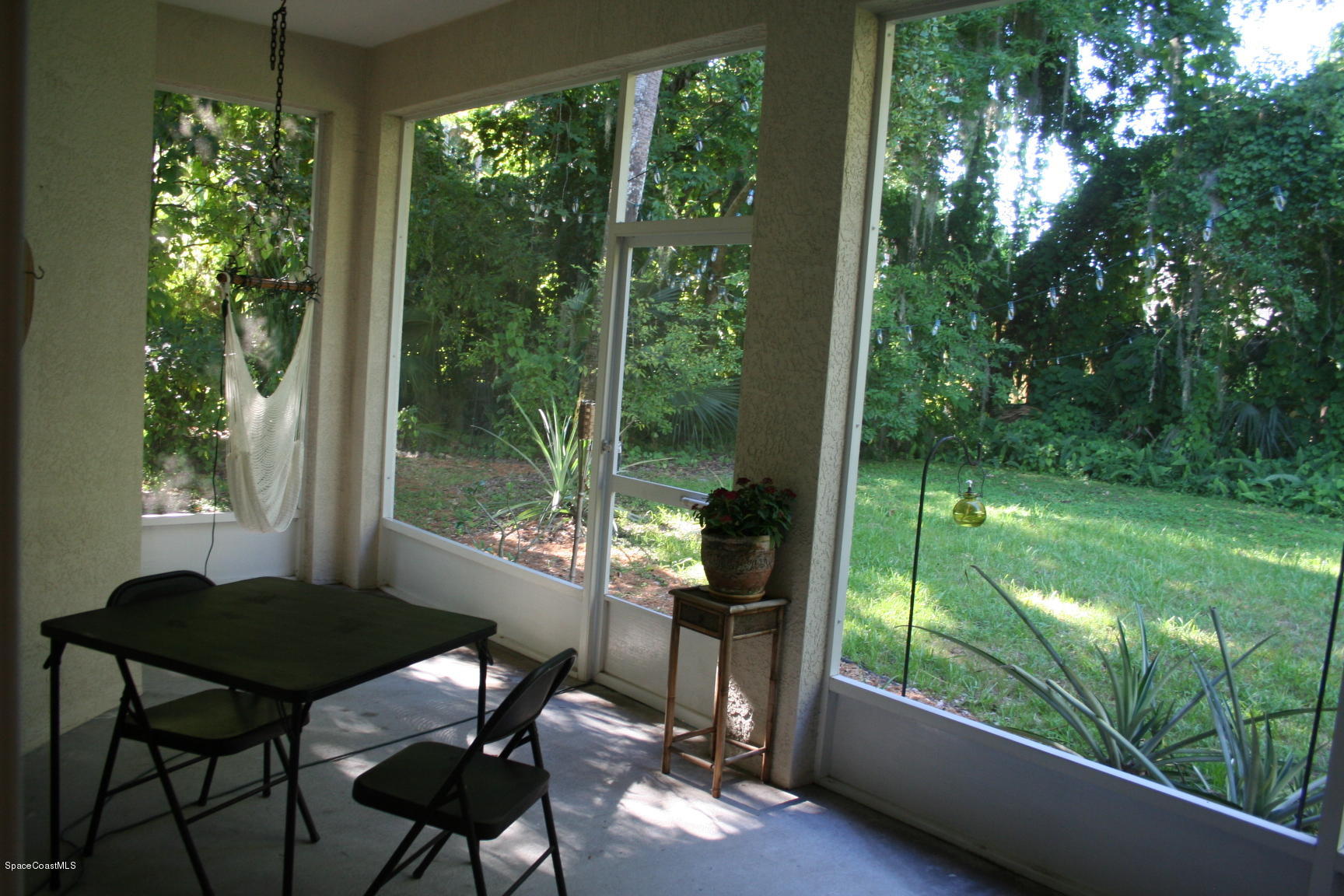 795 Seymour Road Northeast Palm Bay, FL 32905 - Photo 31 of 46 SCREENED PORCH
