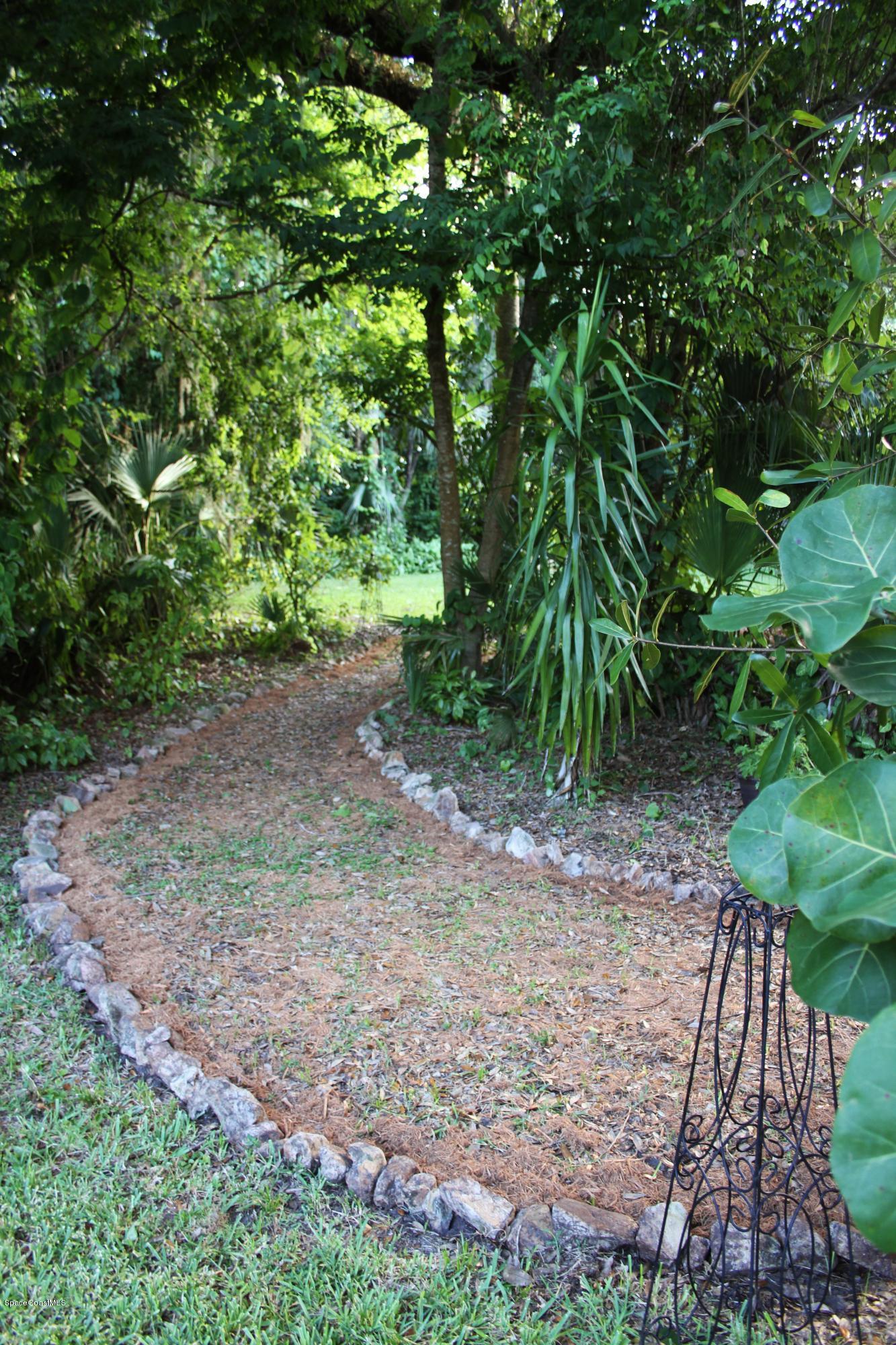 795 Seymour Road Northeast Palm Bay, FL 32905 - Photo 33 of 46 HEADING TO THE SECRET GARDEN