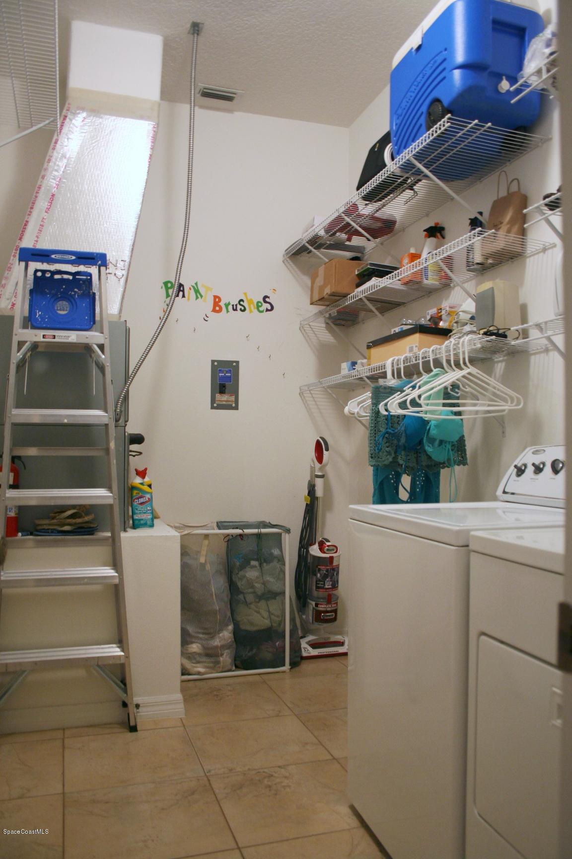795 Seymour Road Northeast Palm Bay, FL 32905 - Photo 44 of 46 LARGER LAUNDRY ROOM