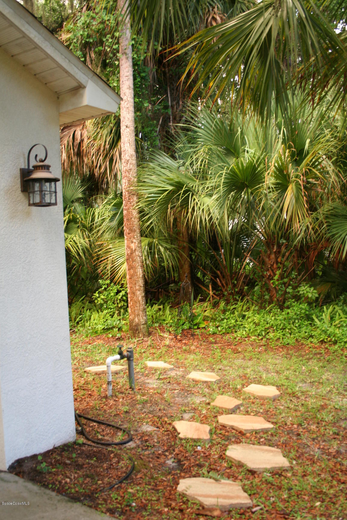 795 Seymour Road Northeast Palm Bay, FL 32905 - Photo 6 of 46 ON OUR WAY TO THE SECRET GARDEN