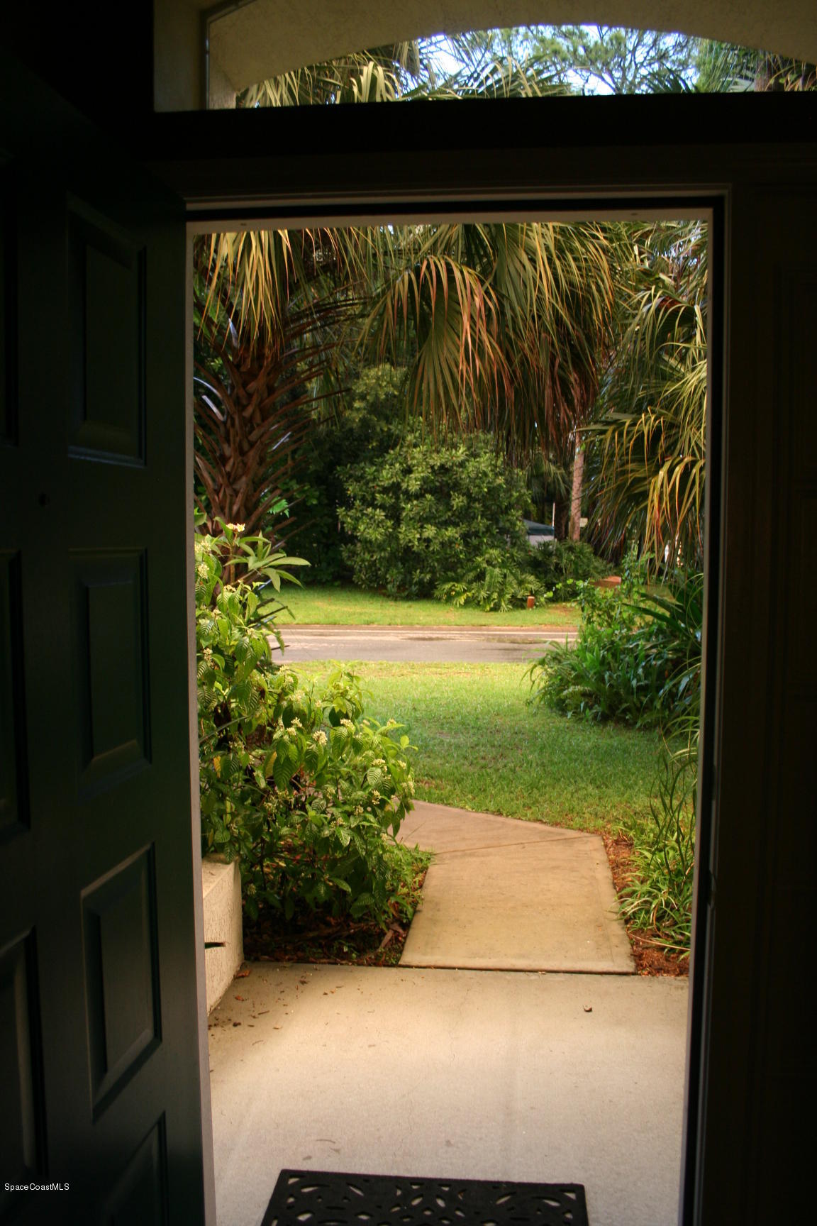 795 Seymour Road Northeast Palm Bay, FL 32905 - Photo 7 of 46 VIEW OUT FRONT DOOR