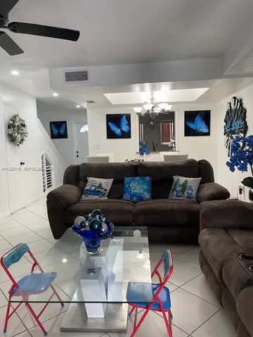 a view of an empty room with a fireplace