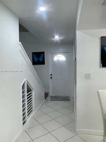 a kitchen with a cabinets and appliances