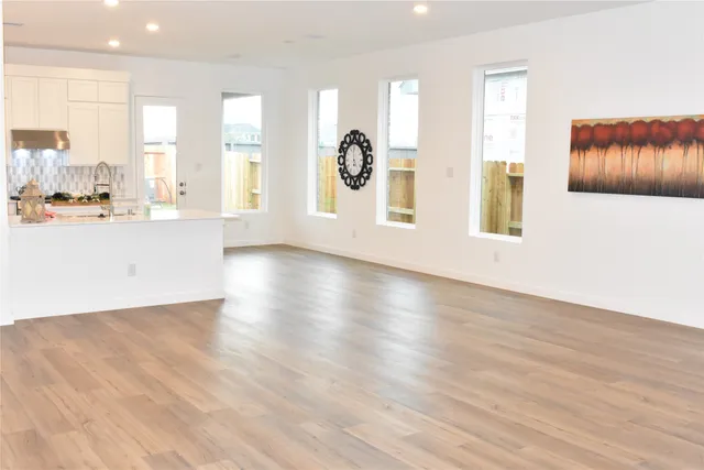 a view of kitchen and windows