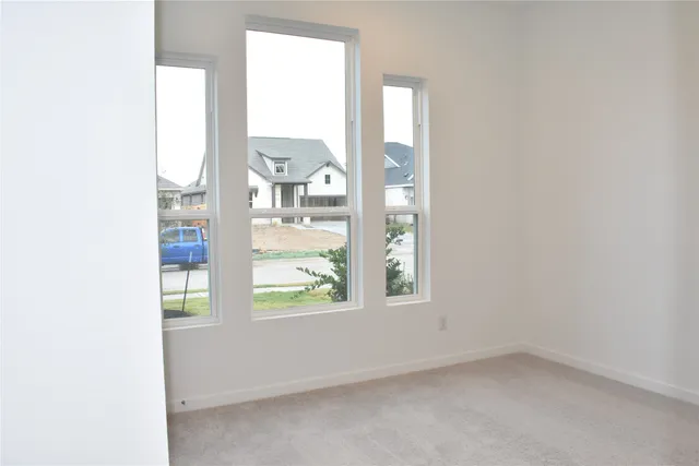 an empty room with windows