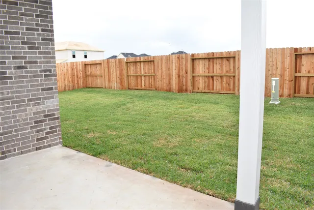 a view of a backyard with garden