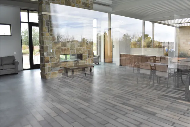 a view of a lake with houses in the background