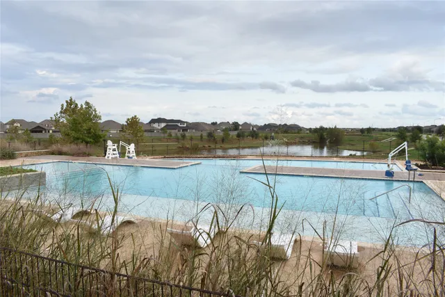 a outdoor space with patio the couches and a dining table with garden view