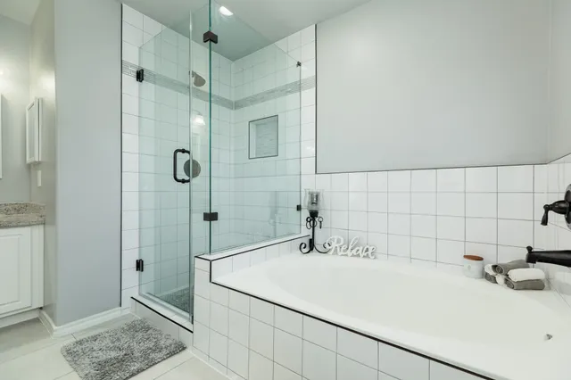 a bathroom with a sink and a shower