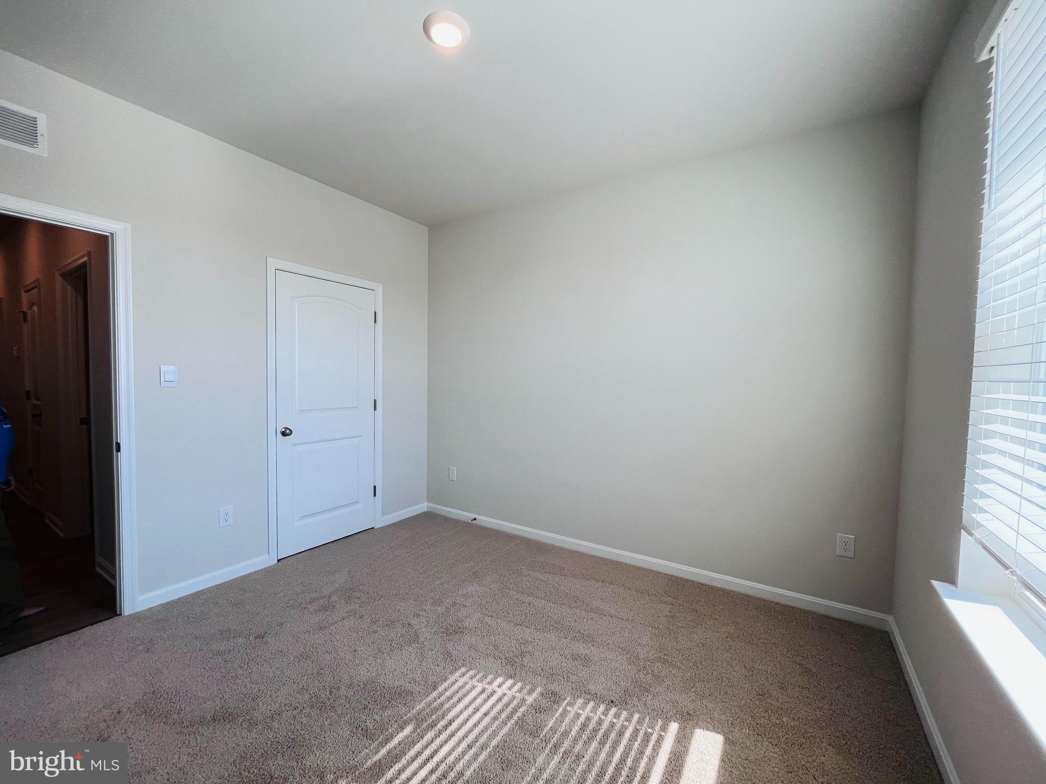120 Ridgley Boulevard Dover, DE 19904 - Photo 11 of 17 an empty room with windows