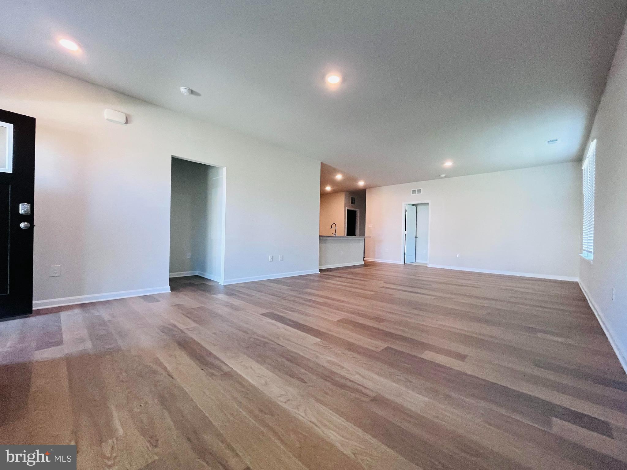 120 Ridgley Boulevard Dover, DE 19904 - Photo 7 of 17 a view of empty room with wooden floor