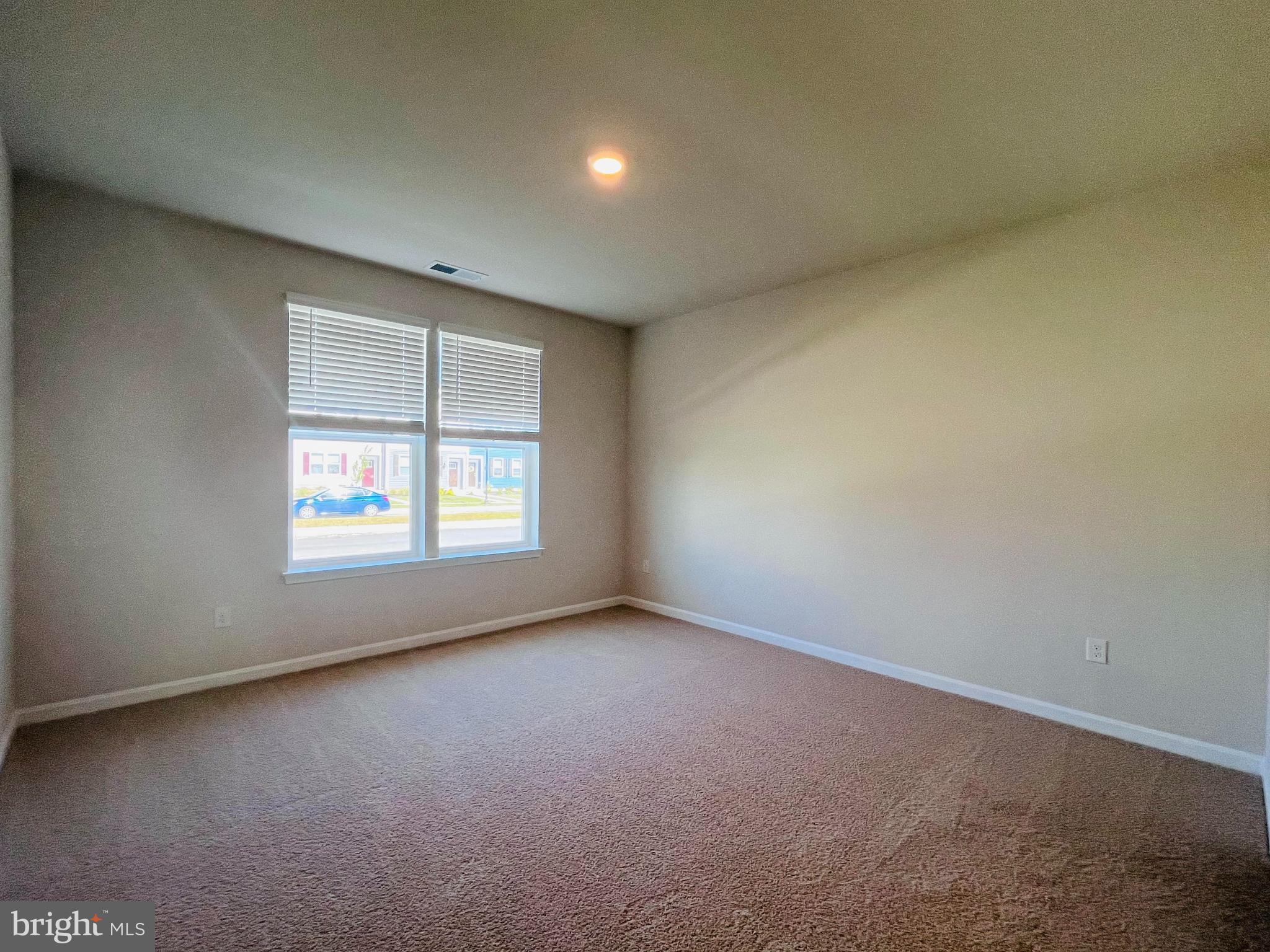 120 Ridgley Boulevard Dover, DE 19904 - Photo 8 of 17 an empty room with a window