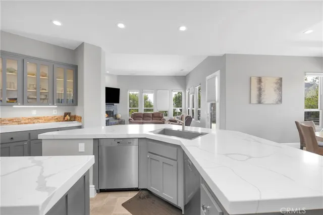 a kitchen with a stove and cabinets