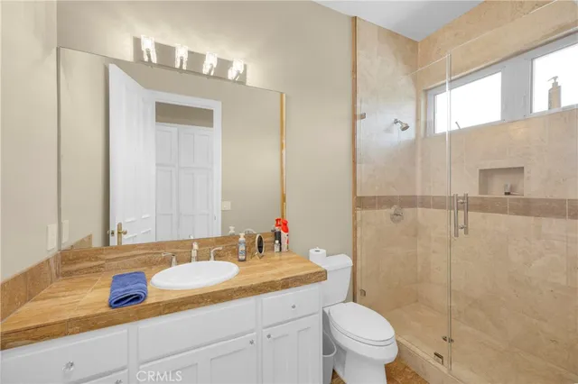 a view of a swimming pool with an outdoor seating and yard