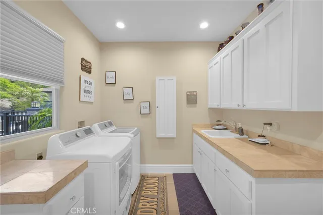 a view of a swimming pool with an outdoor seating