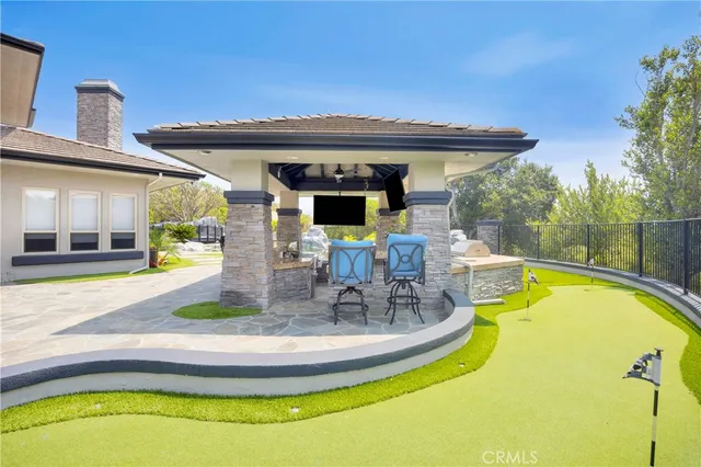 an aerial view of residential house with outdoor space