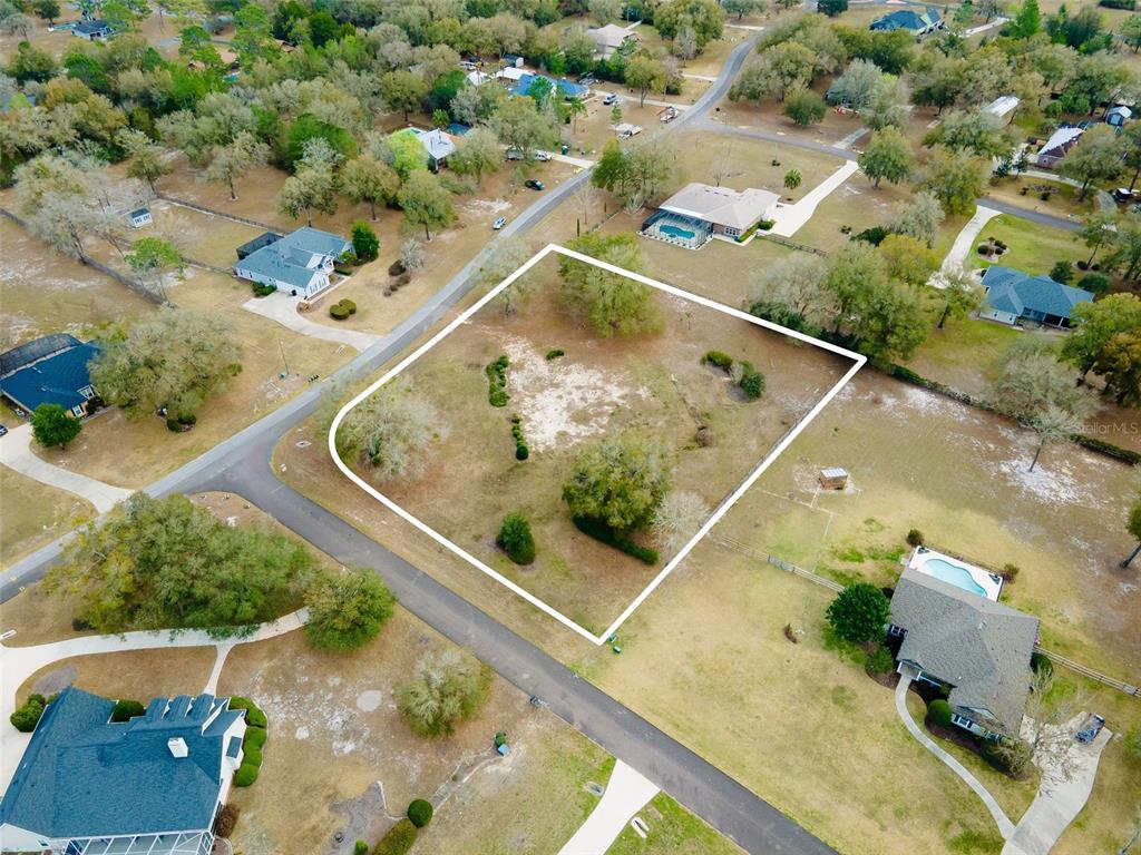 9050 Southwest 84th Street Gainesville, FL 32608 - Photo 15 of 20 an aerial view of a house with a swimming pool