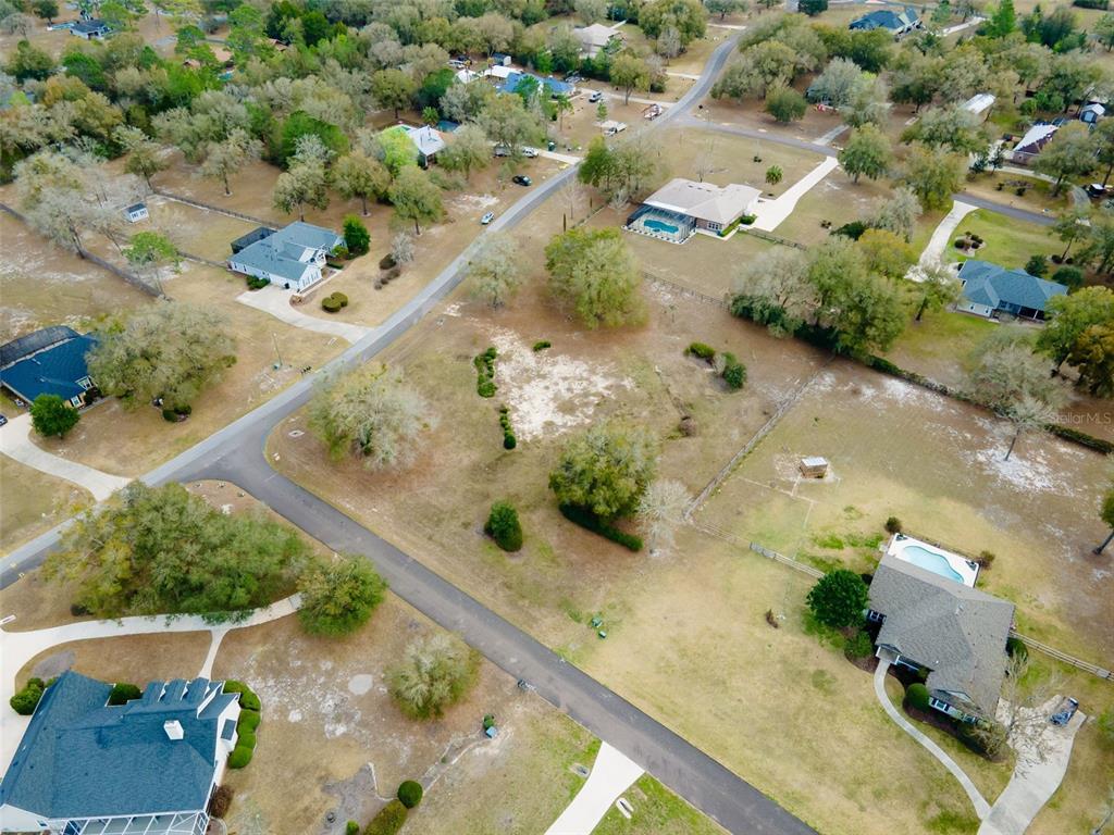 9050 Southwest 84th Street Gainesville, FL 32608 - Photo 16 of 20 an aerial view of house with a yard