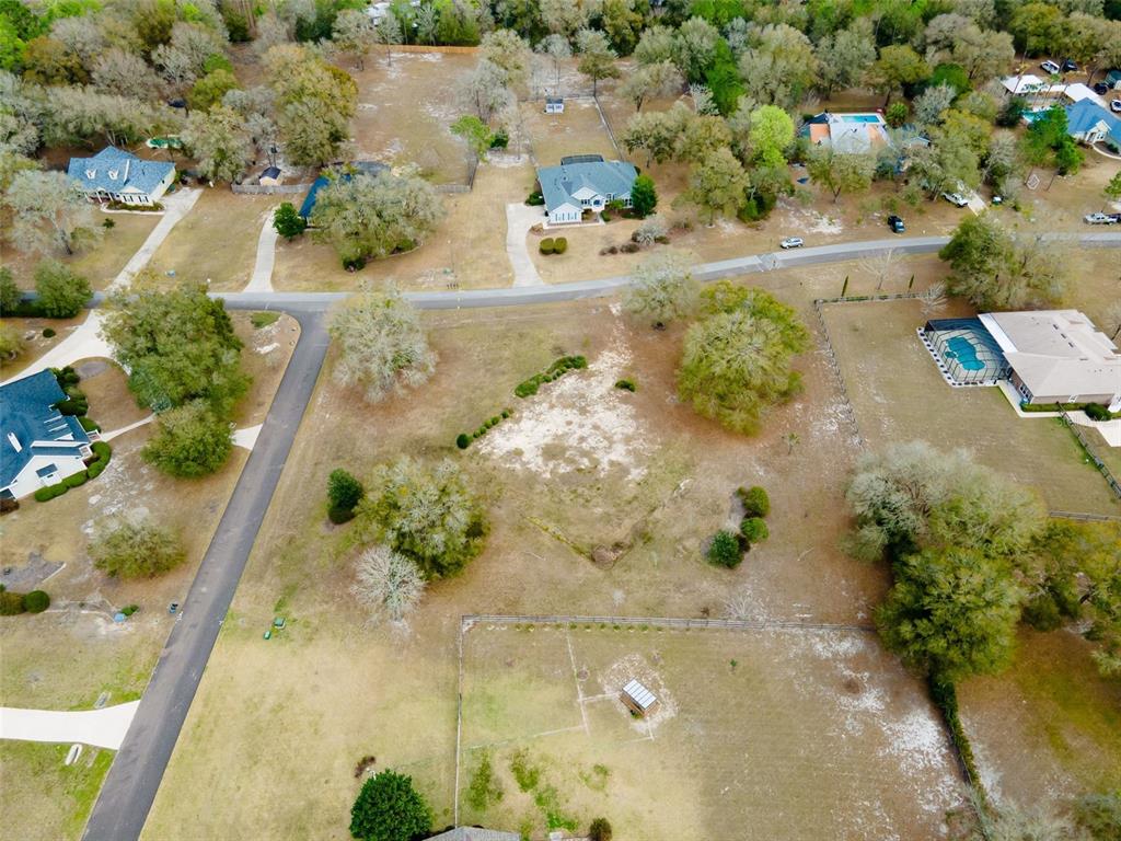 9050 Southwest 84th Street Gainesville, FL 32608 - Photo 18 of 20 an aerial view of a houses with a yard