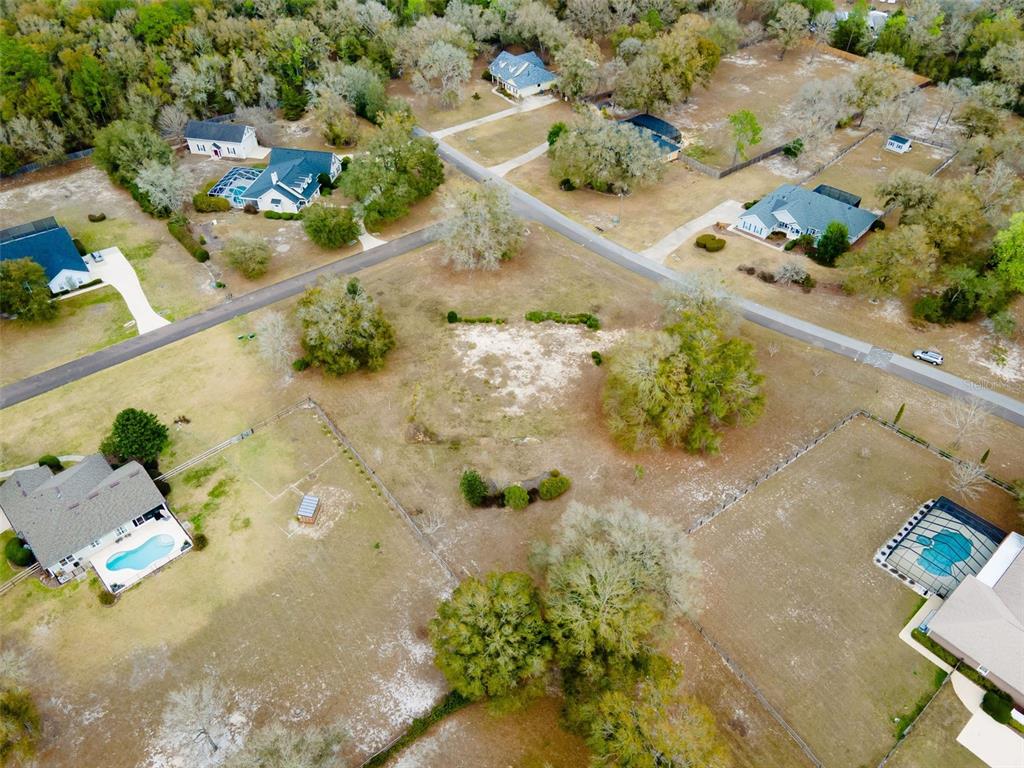 9050 Southwest 84th Street Gainesville, FL 32608 - Photo 20 of 20 an aerial view of residential houses with outdoor space