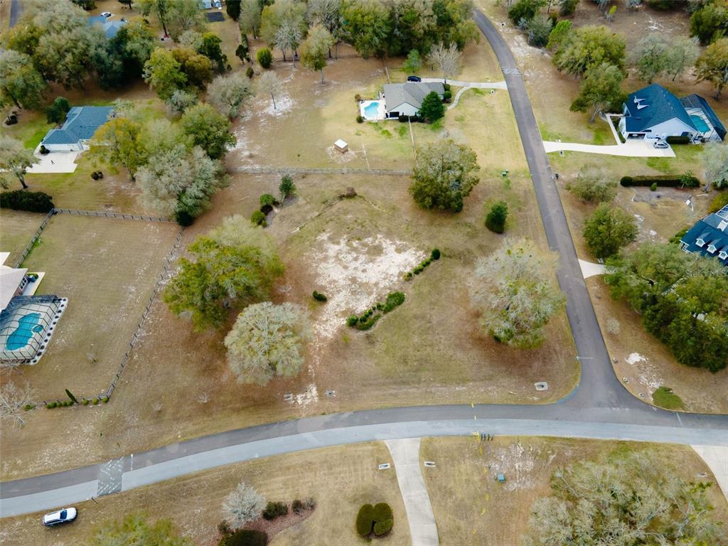 9050 Southwest 84th Street Gainesville, FL 32608 - Photo 2 of 20 an aerial view of a residential houses with outdoor space