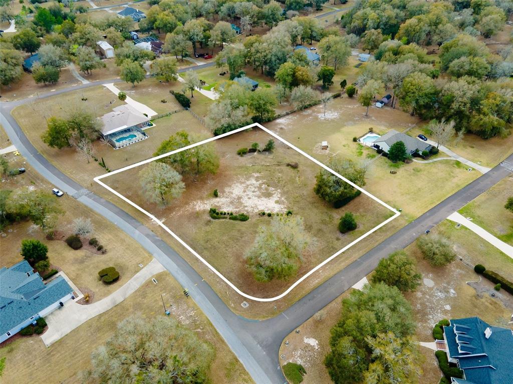 9050 Southwest 84th Street Gainesville, FL 32608 - Photo 3 of 20 an aerial view of a water pond