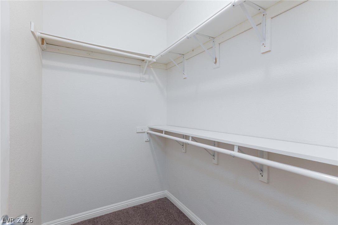 2246 Ramsgate Drive Henderson, NV 89074 - Photo 21 of 36 Functional shelving and hanging space maximize storage in this well-appointed closet.
