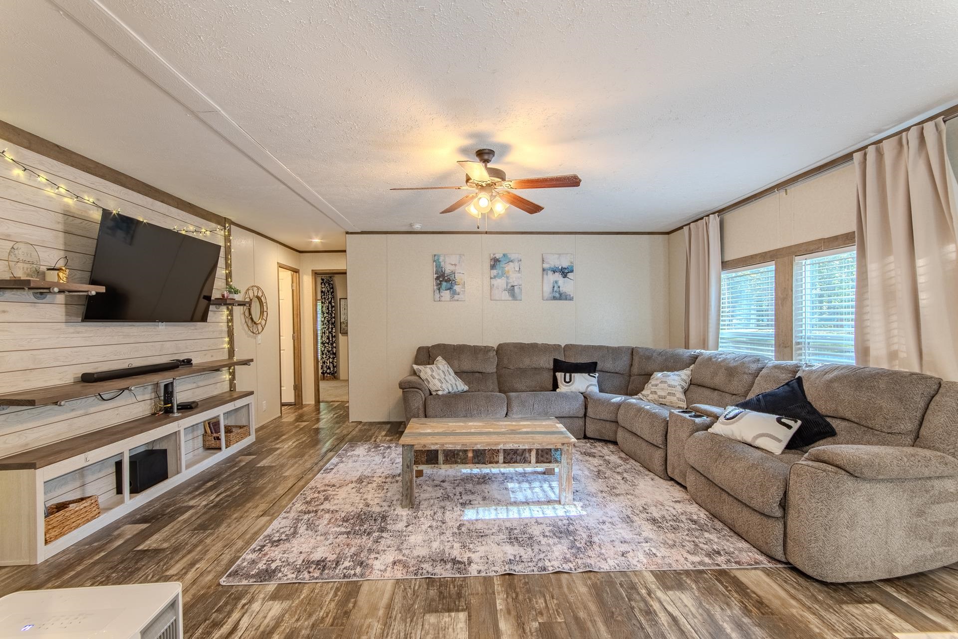 30 Chardonnay Way Counce, TN 38326 - Photo 13 of 37 a living room with furniture and a flat screen tv