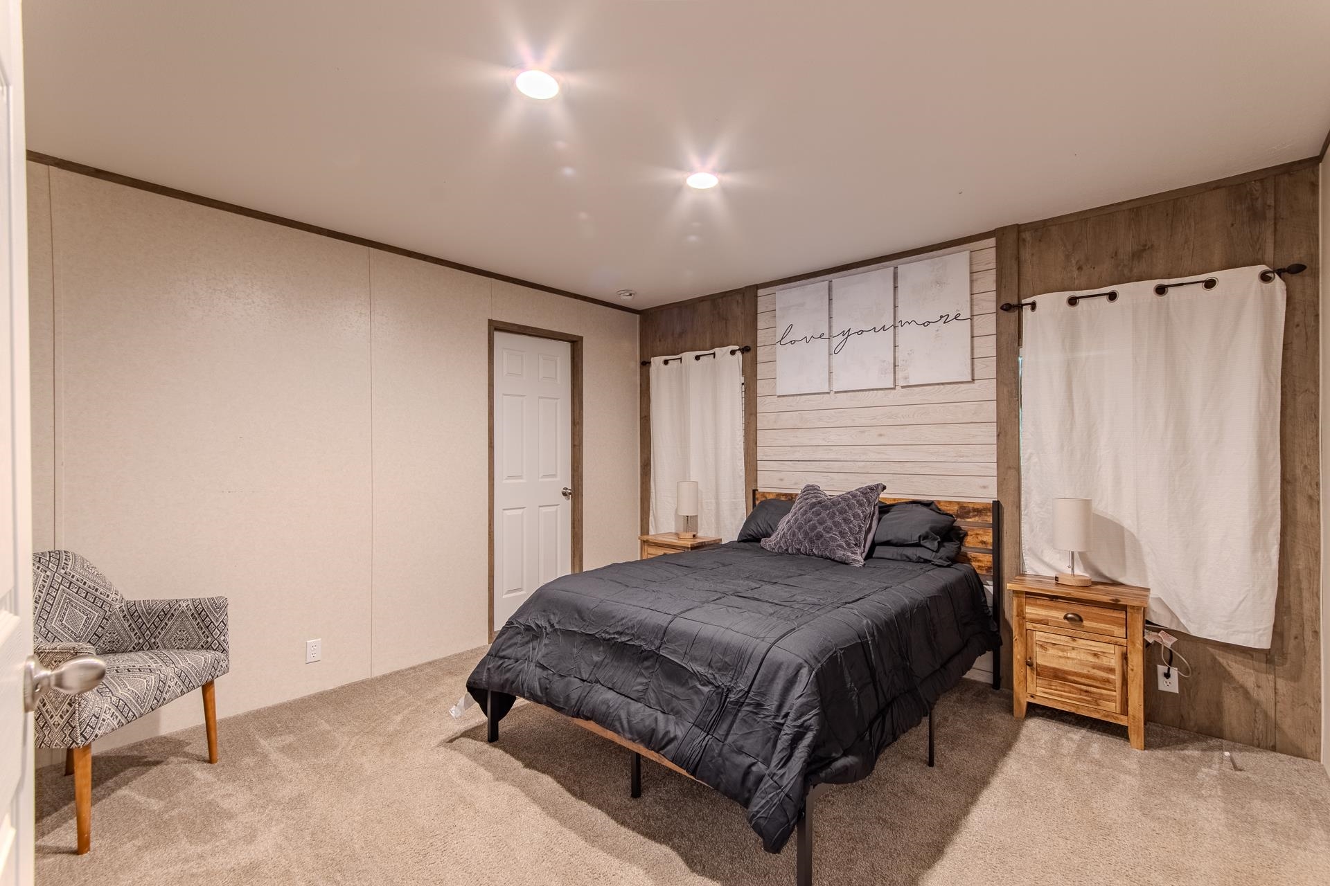 30 Chardonnay Way Counce, TN 38326 - Photo 20 of 37 a bedroom with a bed and a chair with the view of bathroom