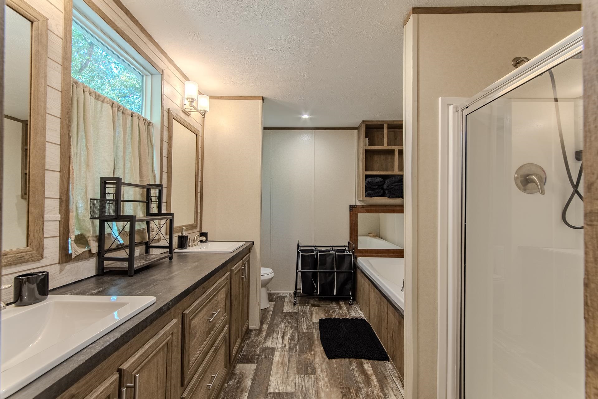 30 Chardonnay Way Counce, TN 38326 - Photo 21 of 37 a view of a bathroom with a tub and a sink
