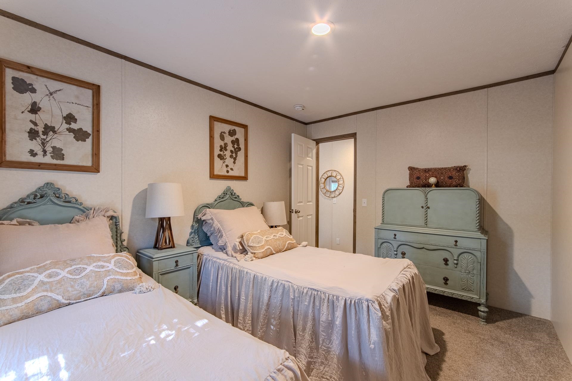 30 Chardonnay Way Counce, TN 38326 - Photo 24 of 37 a bedroom with two beds and painted walls